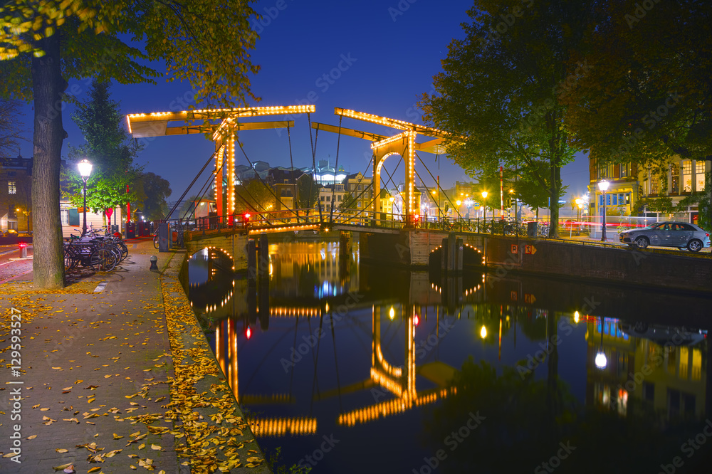 Amsterdam city view with canals and bridges