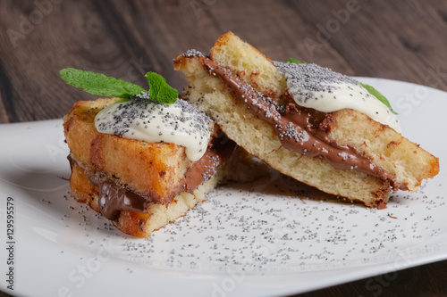 brioche with chocolate cream, sweet cheese and mint