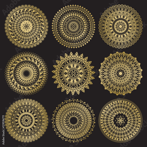 Gold color round abstract ethnic ornament mandalas