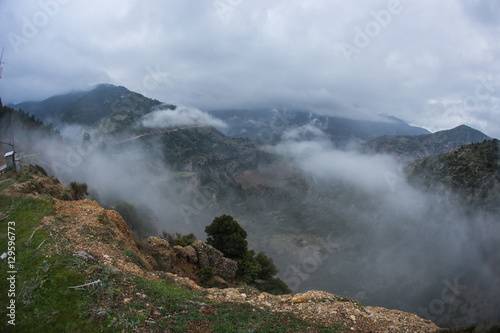 Scenic foggy autumn landscape in mountains near Kalavrita, Pelop photo