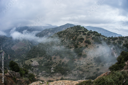 Scenic foggy autumn landscape in mountains near Kalavrita, Pelop photo