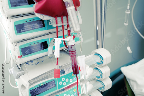 Blood bag on the background of hospital equipment photo