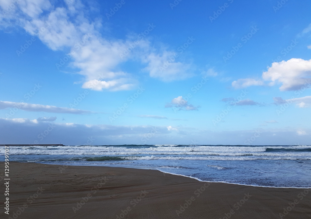 Deserted beach near the blue sea Deserted beach near the blue sea