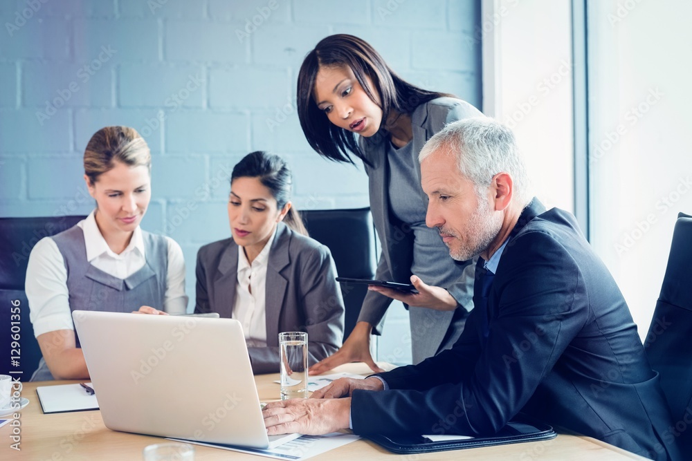 Business people in conference room Business people in conference room