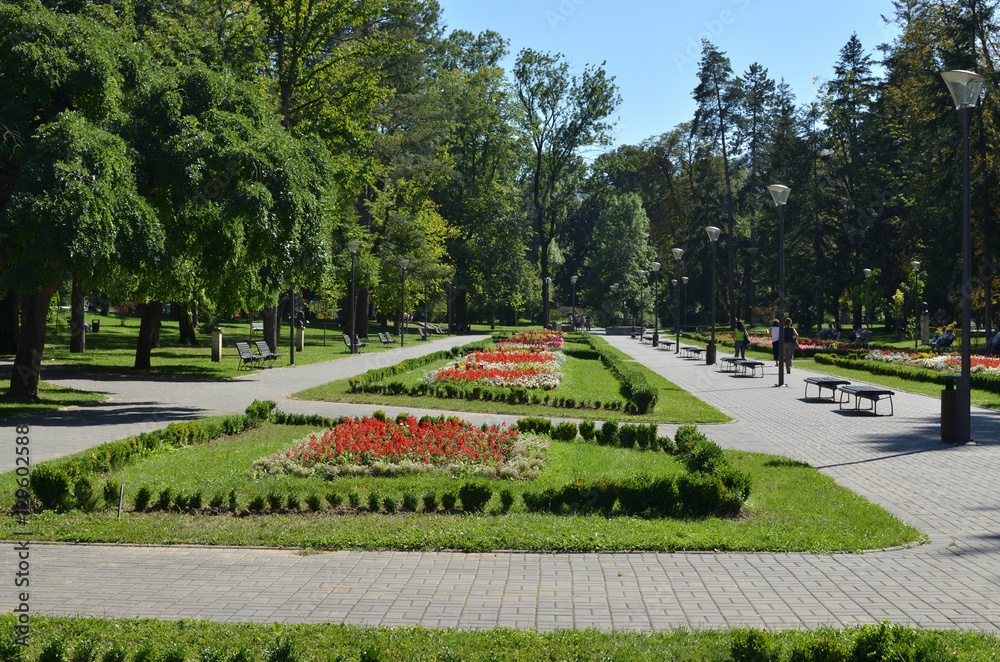 Public park of Vrnjacka Banja, Serbia with flowers and trees in summertime