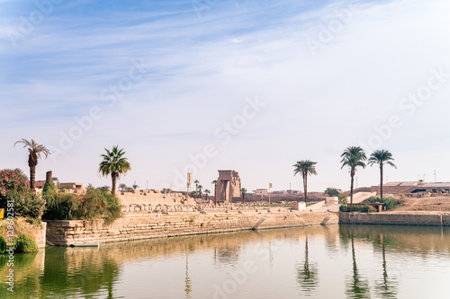 LUXOR, EGYPT  Ancient ruins of Karnak temple in Egypt at noon. The complex is a vast open-air museum, and the second largest ancient religious site in the world