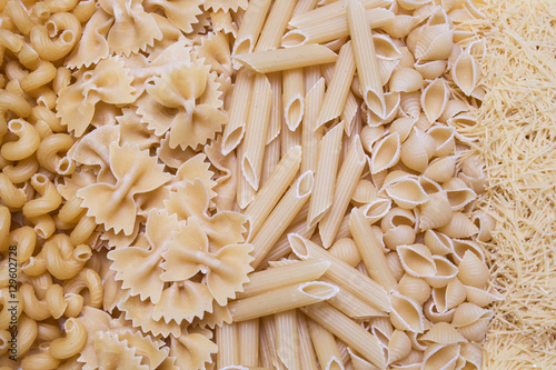 horns, feathers, bows pasta or macaroni and vermicelli backgroun
