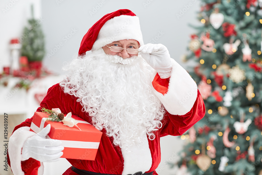Close-up of Santa Claus brought gifts for Christmas. Home decora Close-up of Santa Claus brought gifts for Christmas. Home decora