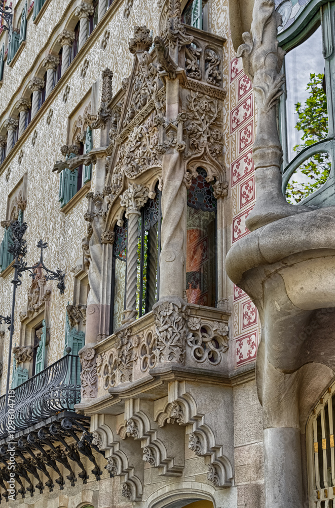Tracery brown balcony of building in Barcelona, Spain