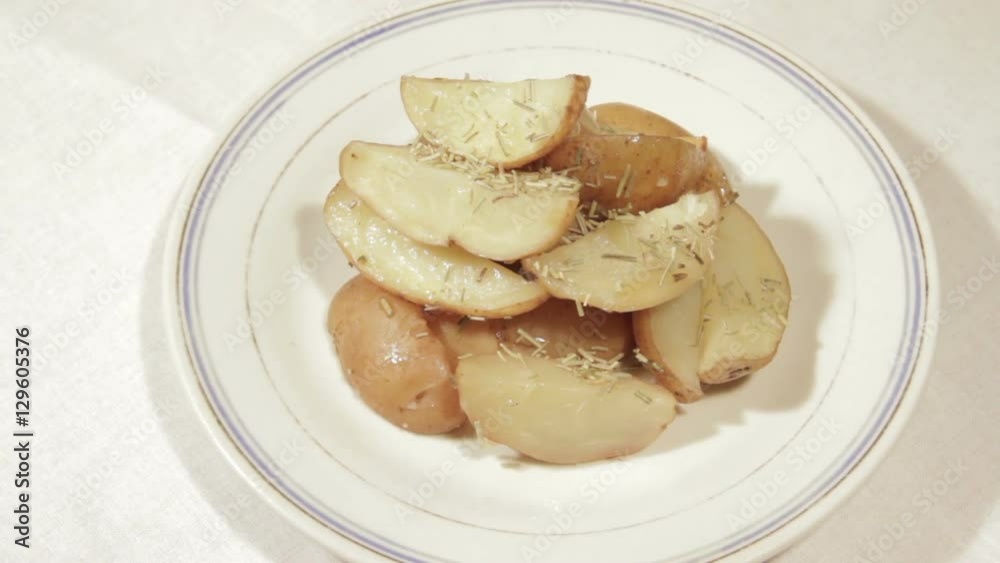 Cooked potatoes in the oven with onions and spices. Cooked potatoes in the oven with onions and spices.
