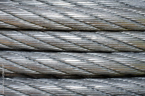 Sturdy steel heavy duty cable wire.  Up close of textured industrial strength wire for tie down or zip line.