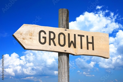 Growth - wooden signpost