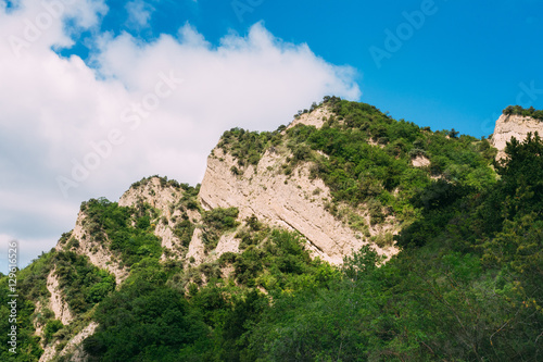 Mtskheta Georgia. White Limestone Mountain Overgrown With Green 