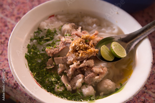 Burmese rice soup noodle at  Kengtung Market, Burma photo