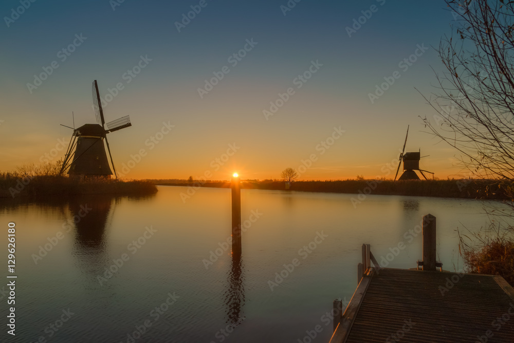 Sunrise at Kinderdijk world heritage site in winter