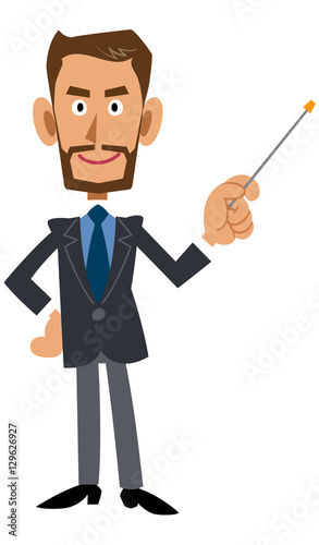 スーツを着用し髭を蓄えた褐色の男性が指し棒を使って説明する
