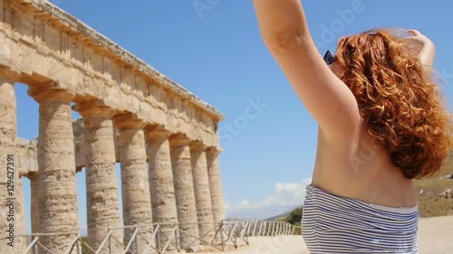 young woman in front of a monument in Sicily: Italy photo