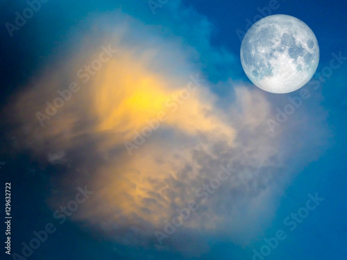 full moon yellow cloud in the blue sky