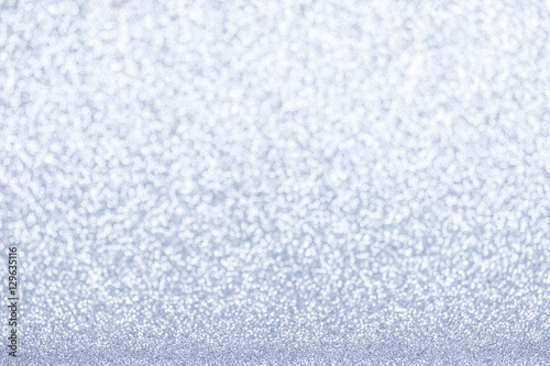 Defocused silver glitter background
