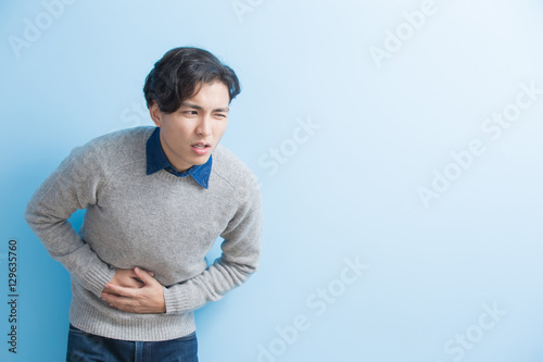 man feel stomach ache