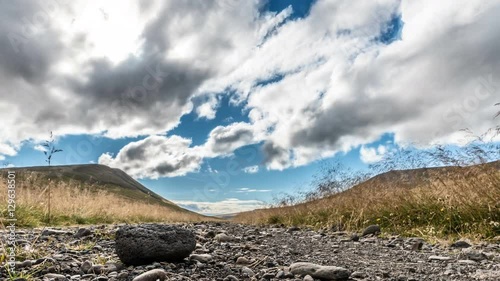Trail with Clouds and stone in foreground 4K