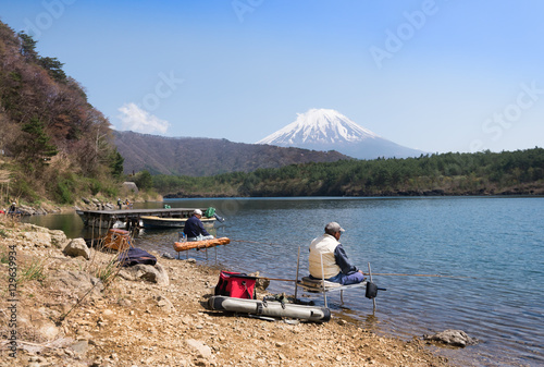 Mt Fuji behind with fishing men