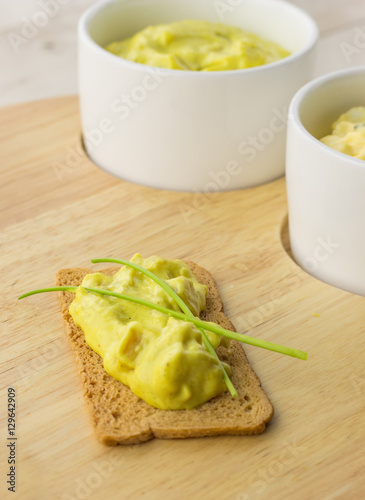 Cracker with curried chicken salad photo