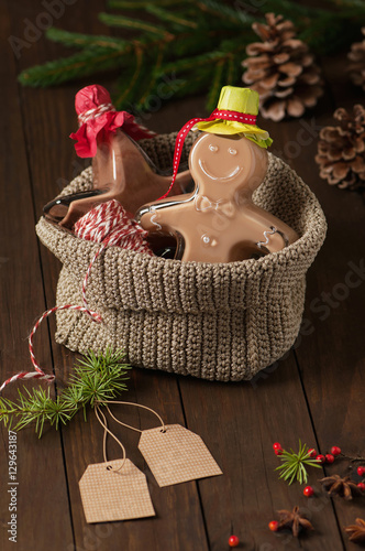 Two bottles with homemade gingerbread and speculoos liqueur as christmas gift. photo