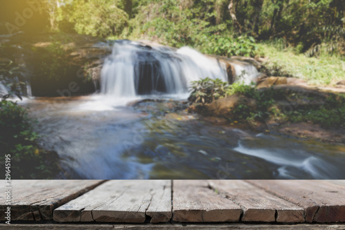 wood table for montage or display your product with blur backgro