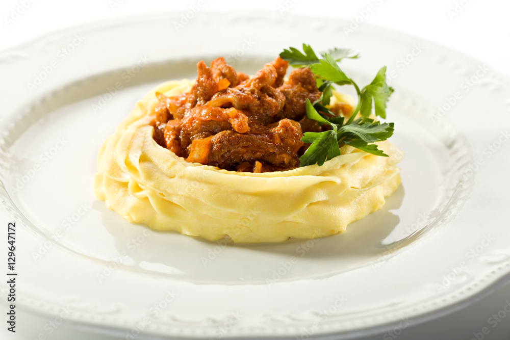 Stewed Meat Served with Mashed Potato Stewed Meat Served with Mashed Potato