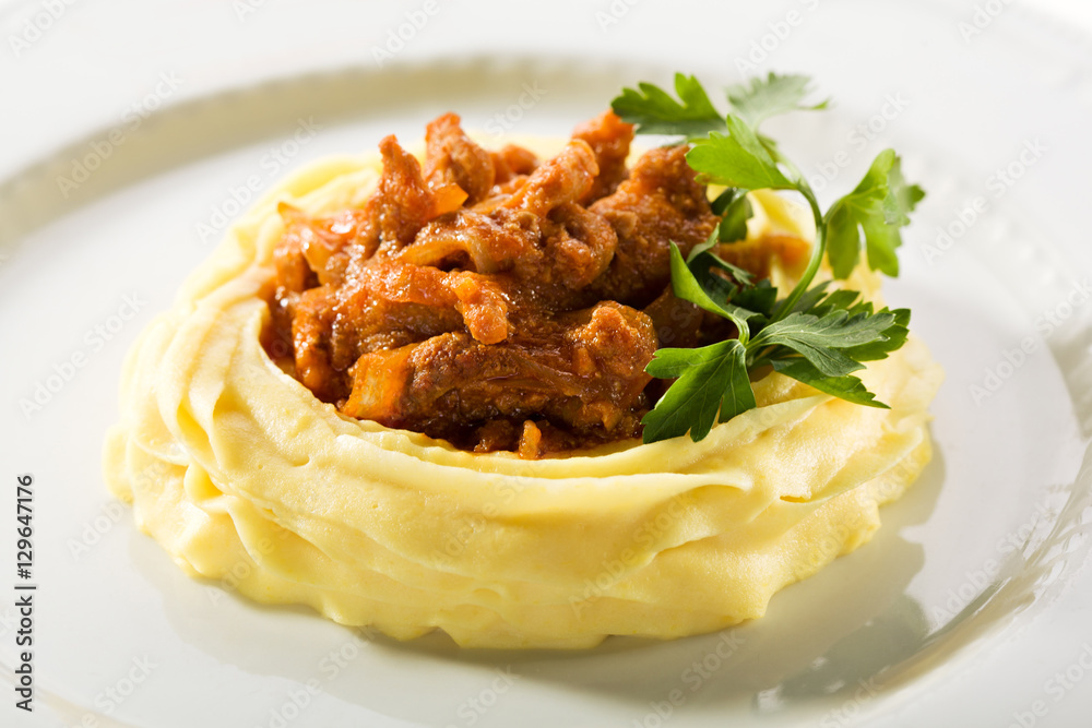 Stewed Meat Served with Mashed Potato Stewed Meat Served with Mashed Potato