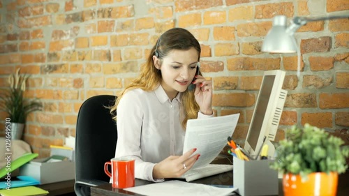 Call center agent calling to customer about bank loan
