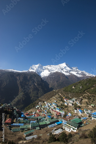 Namche Bazaar is the last town during the trek to Everest Base Camp, seen here with Kongde peak, Khumbu (Everest) Region, Nepal, Himalayas