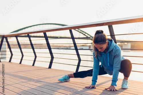 Woman streching after training photo