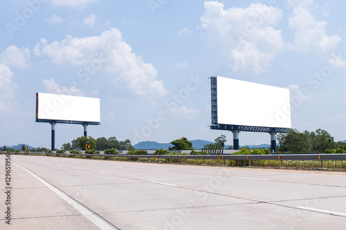 two blank billboard on the highway