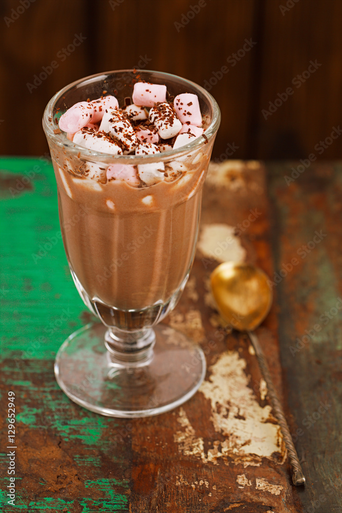 hot chocolate with marshmallows in a tall glass hot chocolate with marshmallows in a tall glass