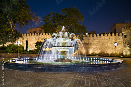 Fountain in front of ancient fortress wall in Baku, Azerbaijan.