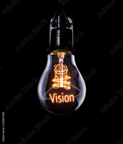 Obraz na płótnie Hanging lightbulb with glowing Vision concept. w salonie