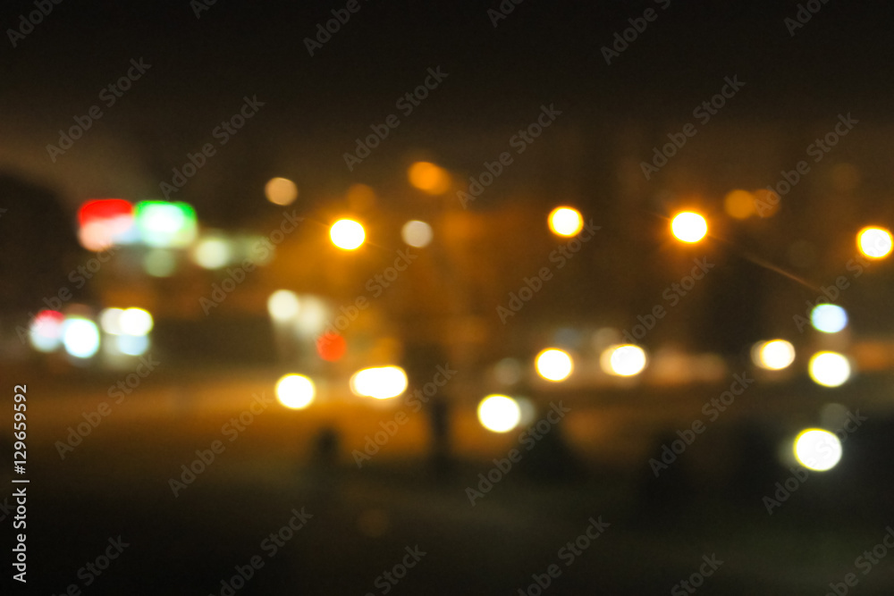 Abstract background of blurred city lights with bokeh effect