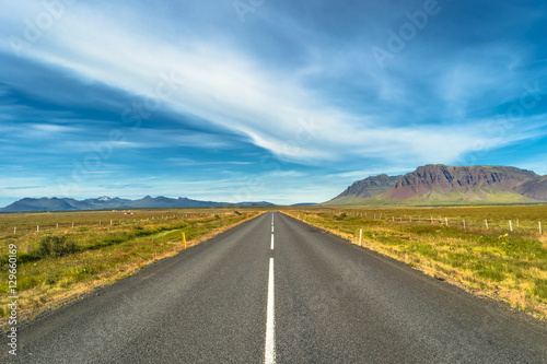 Isolated road and Icelandic landscape at Iceland  summer