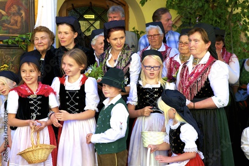 Participants in the Feast of Corpus Christi Celebrations in their traditional dress, St. Wolfgang, Wolfgangsee Lake, Austria photo