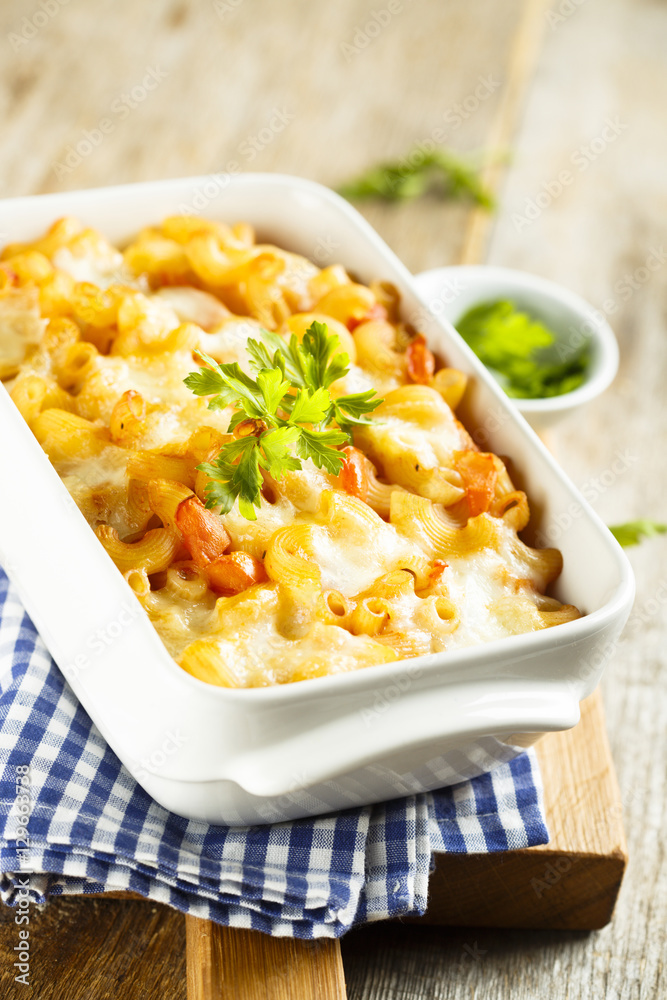 Pasta bake with tomato sauce and mozzarella cheese Pasta bake with tomato sauce and mozzarella cheese