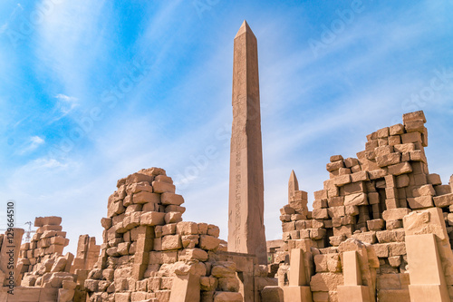 LUXOR, EGYPT: Ancient ruins of Karnak temple in Egypt at noon. The complex is a vast open-air museum, and the second largest ancient religious site in the world photo