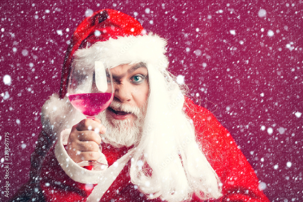 winking Christmas man with wine glass winking Christmas man with wine glass