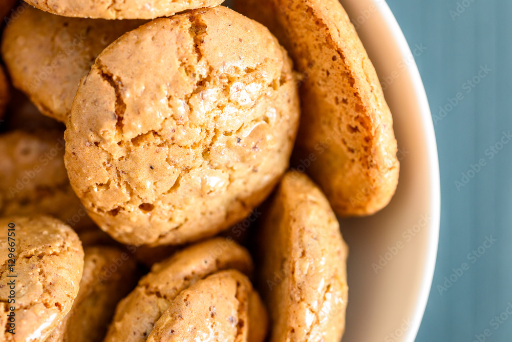 Italian Amaretti Biscuits In White Bowl Italian Amaretti Biscuits In White Bowl