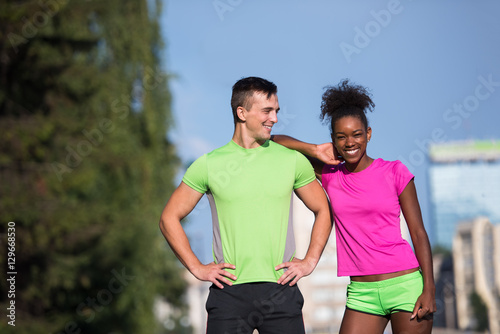 portrait of young multietnic jogging couple ready to run © .shock
