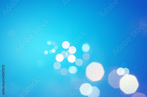 Blurred background : sunset landscape with bokeh sun light abstract background. blur concept. Retro color style. mountain background grass, wallpaper design
