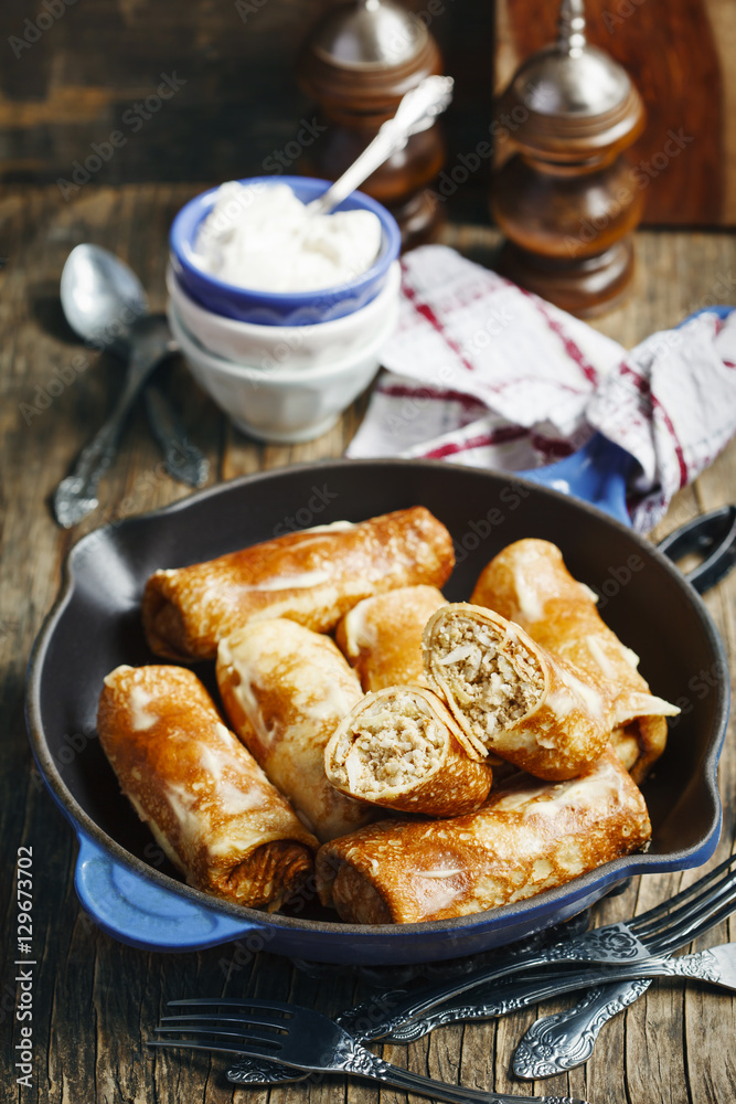 Crepes stuffed with minced meat and rice Crepes stuffed with minced meat and rice