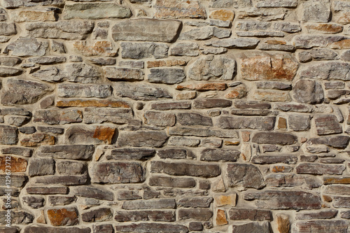 Stone wall rustic texture  background..