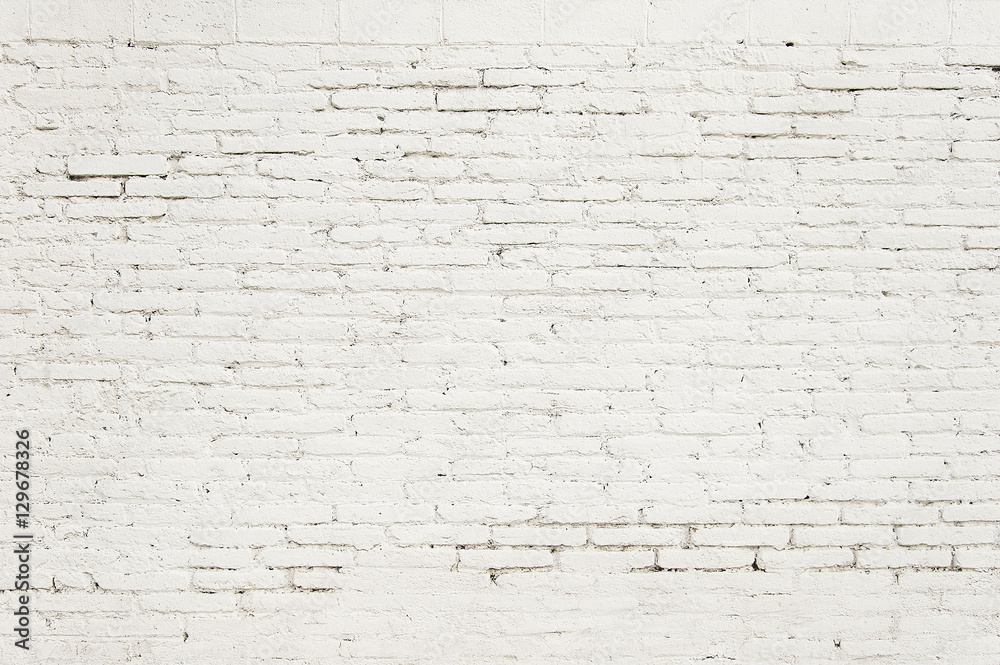 Obraz premium Old brick wall with white paint background texture